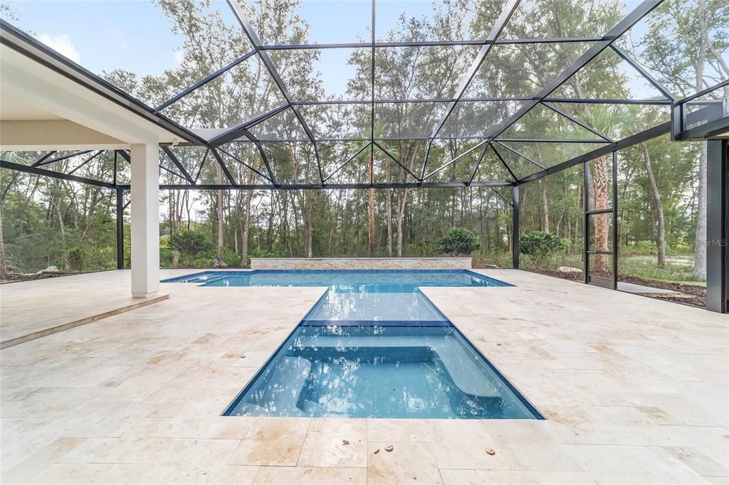 POOL HIGHLIGHTS STONE BACK WALL WITH WATER FEATURES