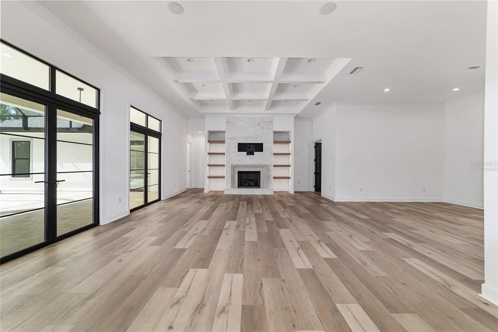 LOOKING FROM KITCHEN TOWARDS GREAT ROOM - NOT VIRTUALLY STAGED