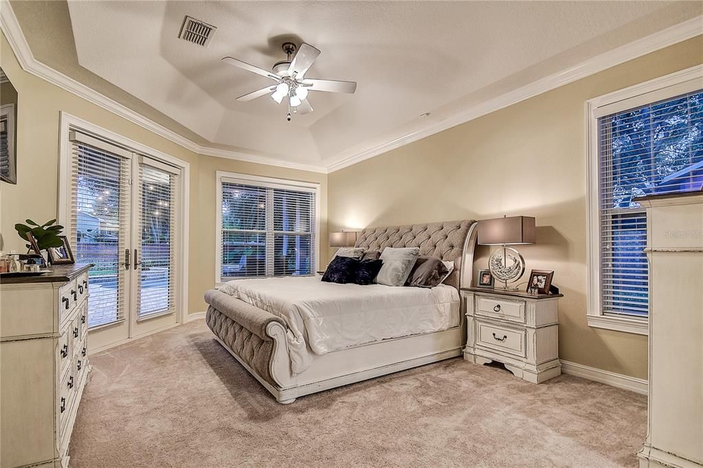 offers a modern feel with high tray ceilings!