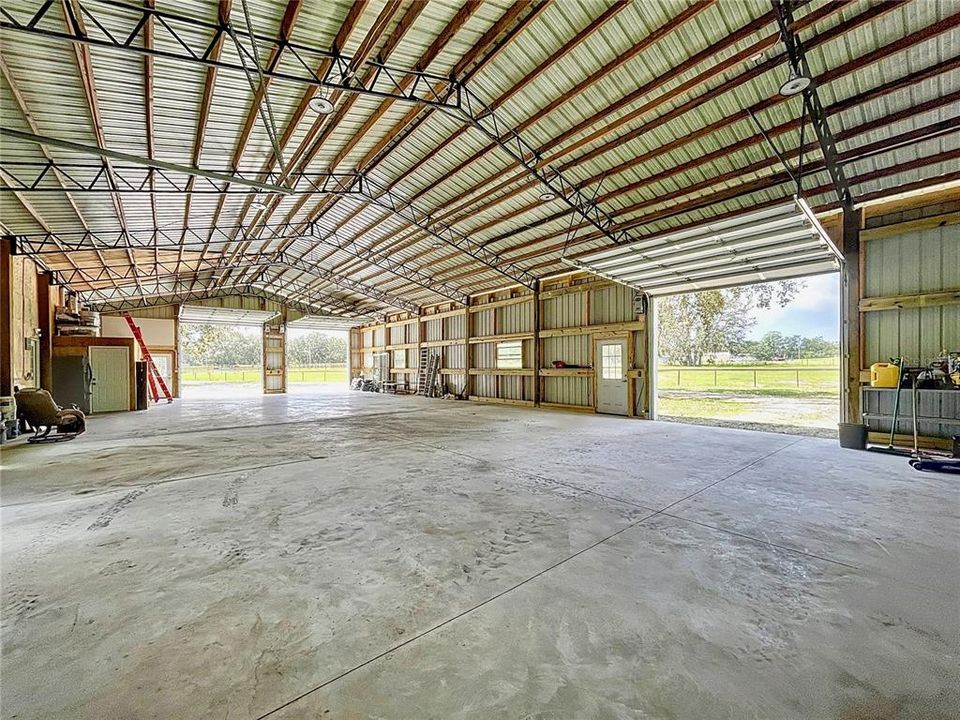 View from the back right corner of the garage looking out. 2 front doors are 12ft side door is 10ft.