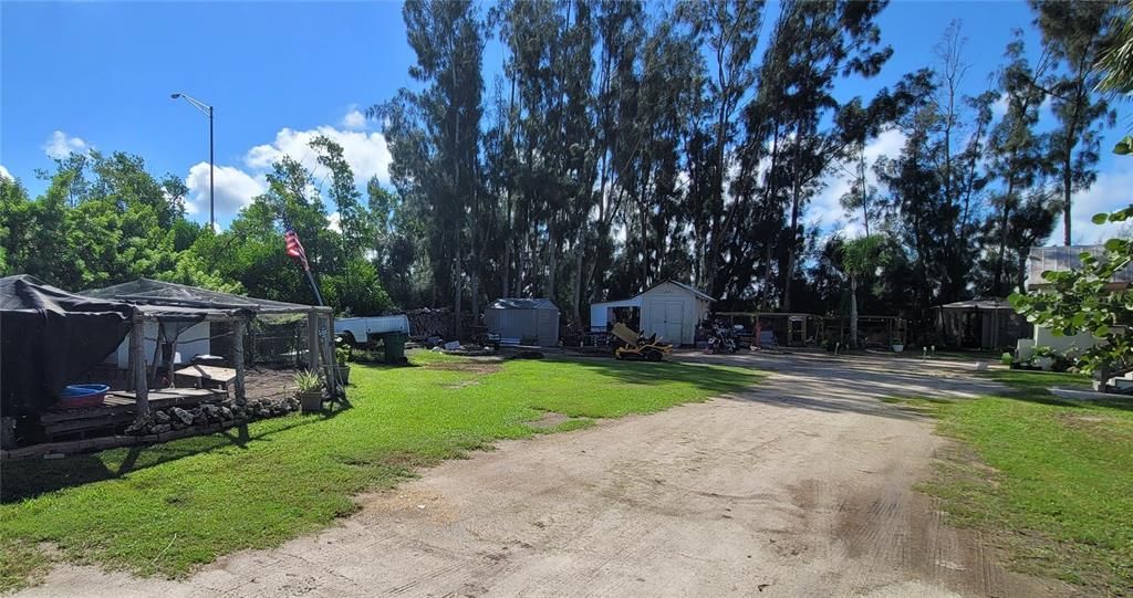 Front cottage driveway and out buildings