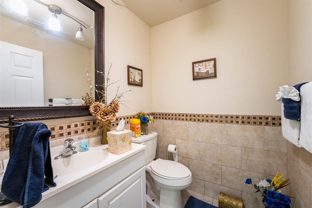1/2 Bathroom located in front of Laundry room.