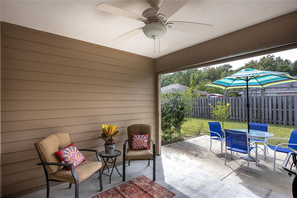 Patio with pull down sun shade.