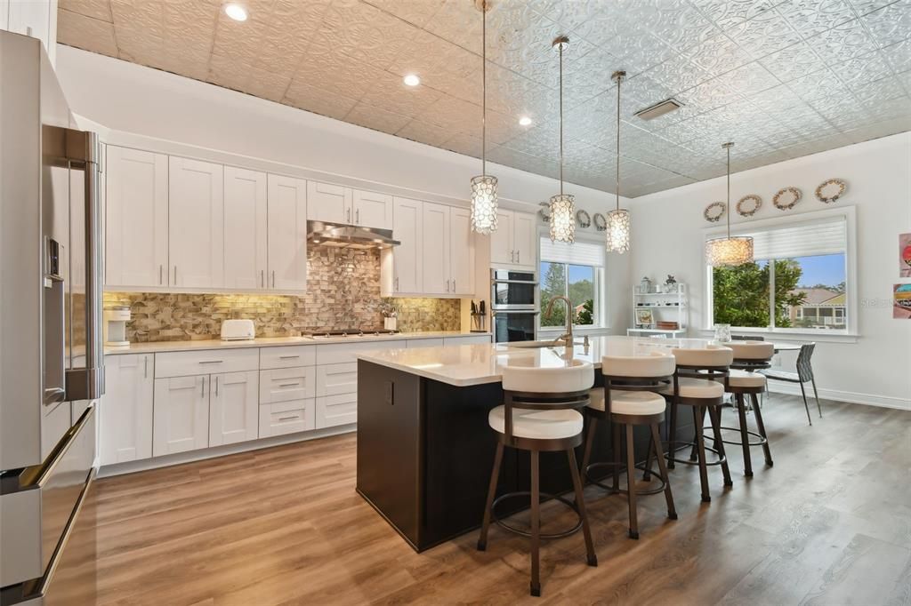 Stunning quartz island with a custom tin ceiling