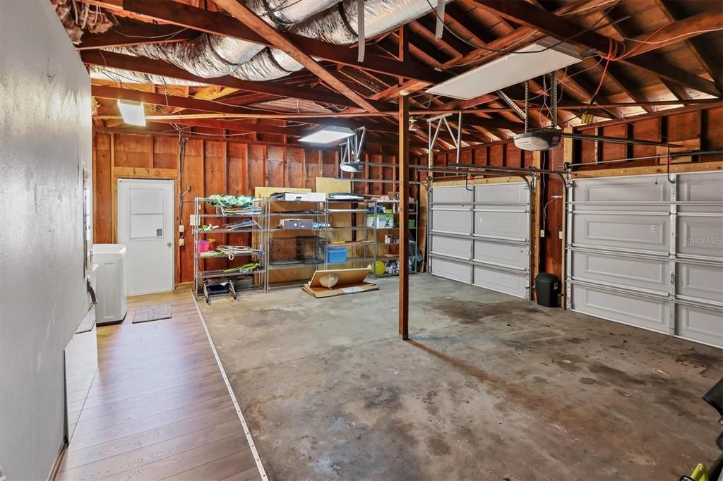 Two car garage plus laundry and storage
