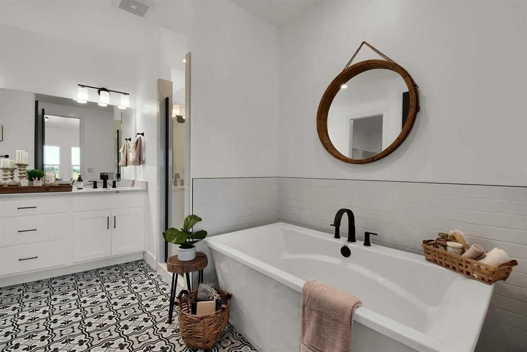 Master Bathroom.  Accessories shown are not included. Counter Tops, Flooring, Sinks, Tub, Mirrors, Fixtures and Shower Door may vary. All such details to be discussed and concluded at the Bulder Meeting.