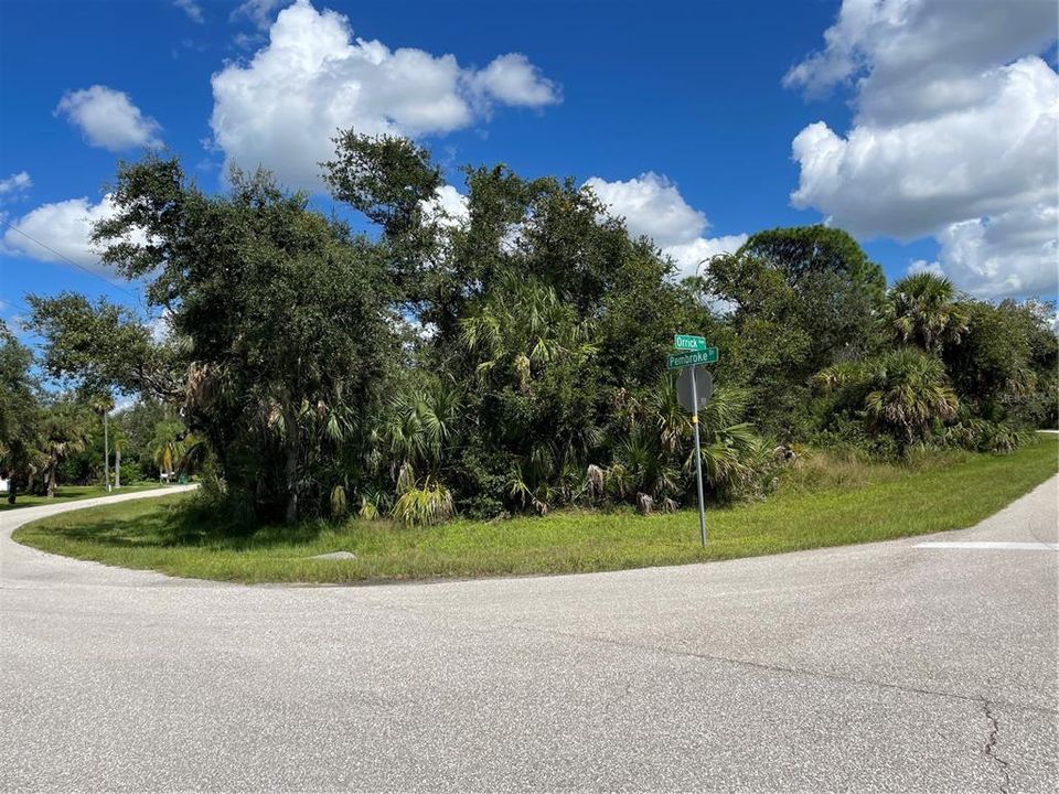 Oversized corner double lot in Northwest Port Charlotte.  Power, county water, and sewer are available.