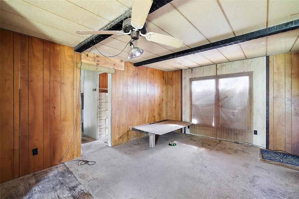 Living Room - 22X15 - Sub-flooring exposed; ceiling/roof leaks.