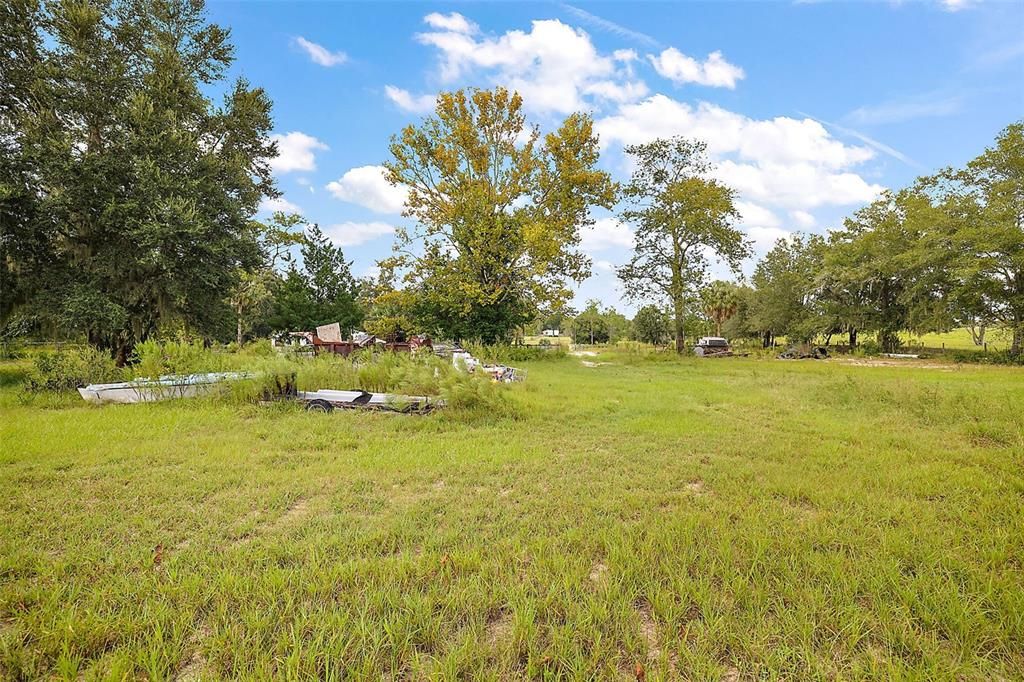 Acreage - high and dry, directly behind the home.