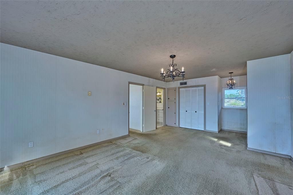 Master Bedroom downstairs on lake side of house