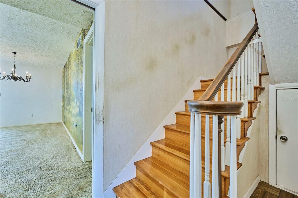 Wooden stairway leading to upstairs