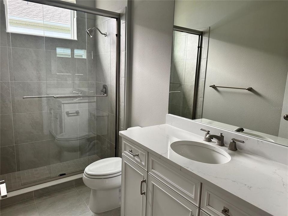 Guest bath with shower and glass doors