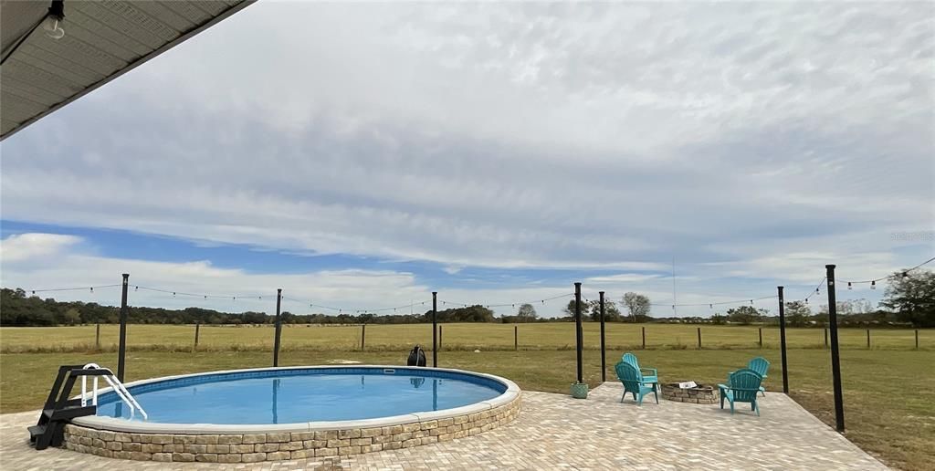 pool, firepit and pasture