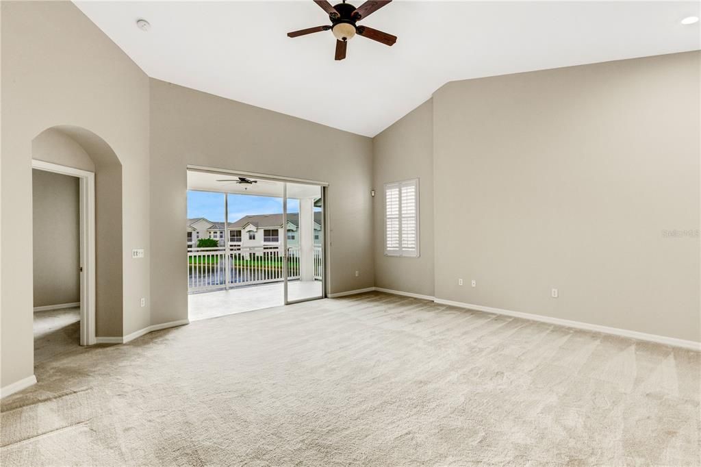 To a spacious greatroom with vaulted ceilings and a killer view.