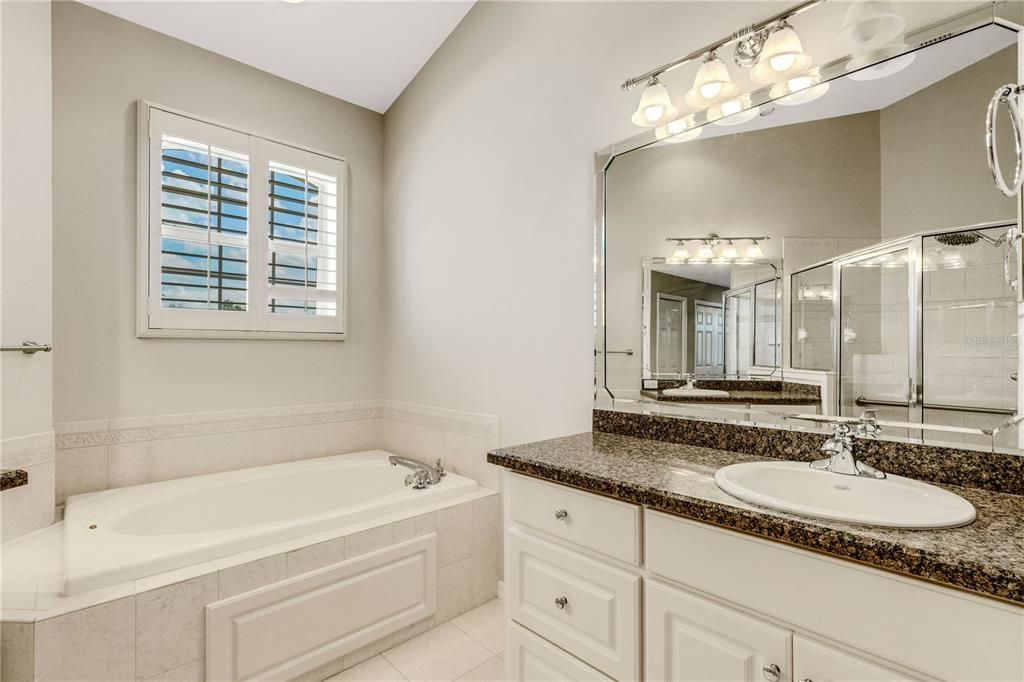 With dual vanities and a large soaking tub.