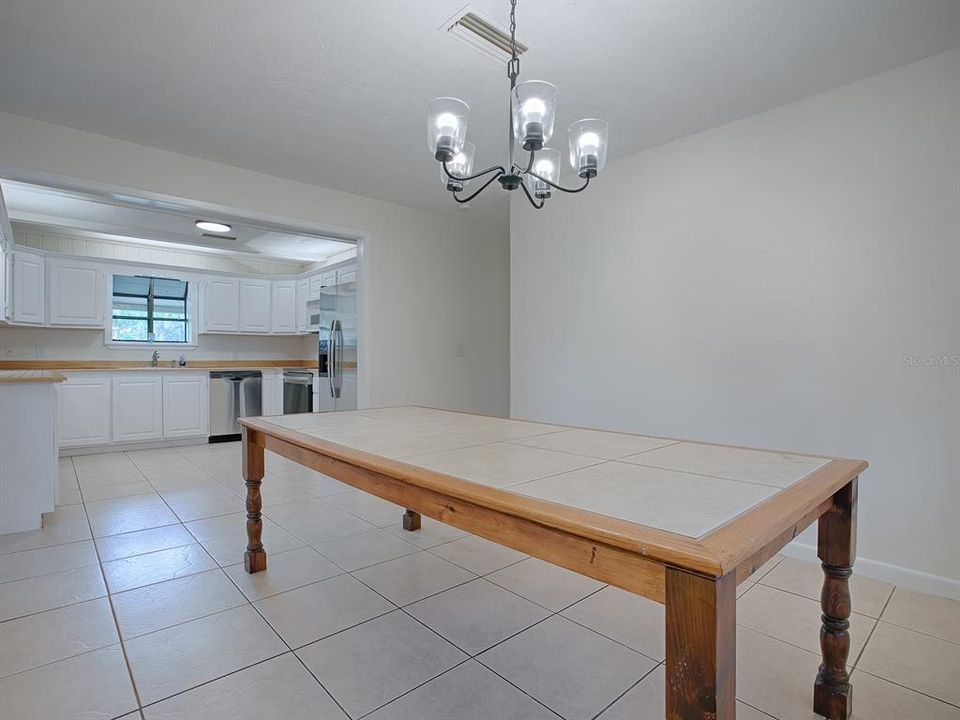 PLENTY OF DINING SPACE IN THE KITCHEN