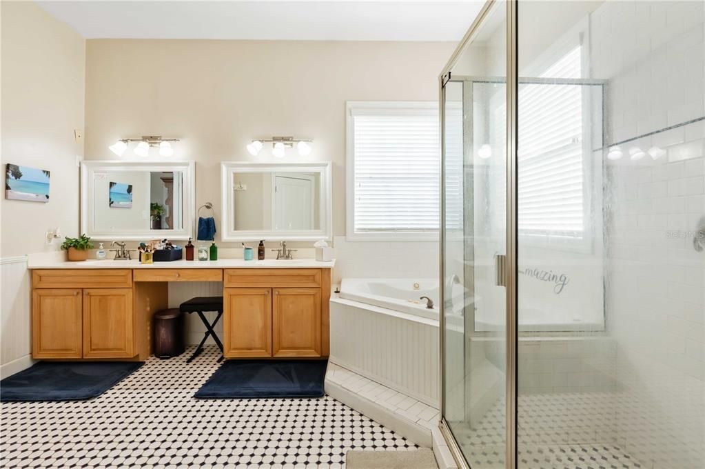 Master Bath with dual sinks, walk in shower and jacuzzi tub