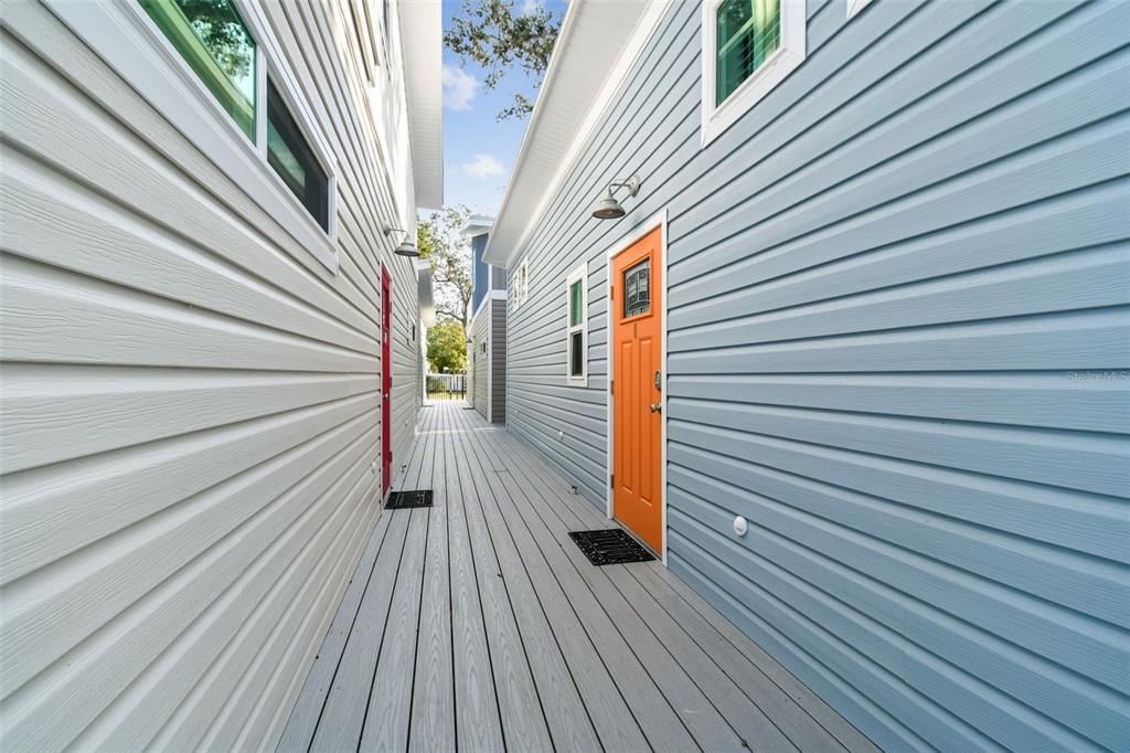 Walkway between Tiny Homes towards Trail