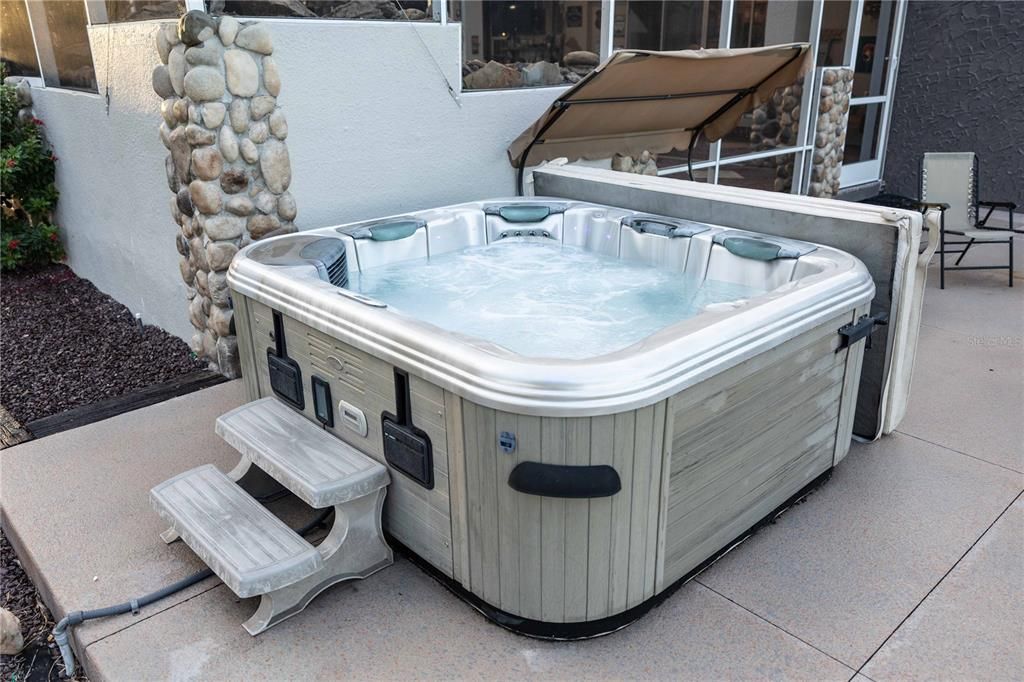 Spacious hot tub perfect for relaxing on a cool night
