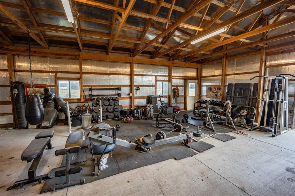 Explore the vast potential of this generously spacious barn shed interior