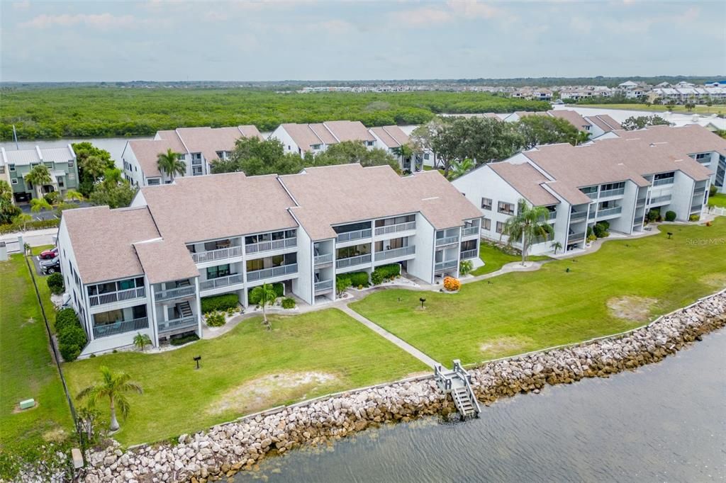 Aerial View of Back of Building.  Sidewalk Leading to Dock