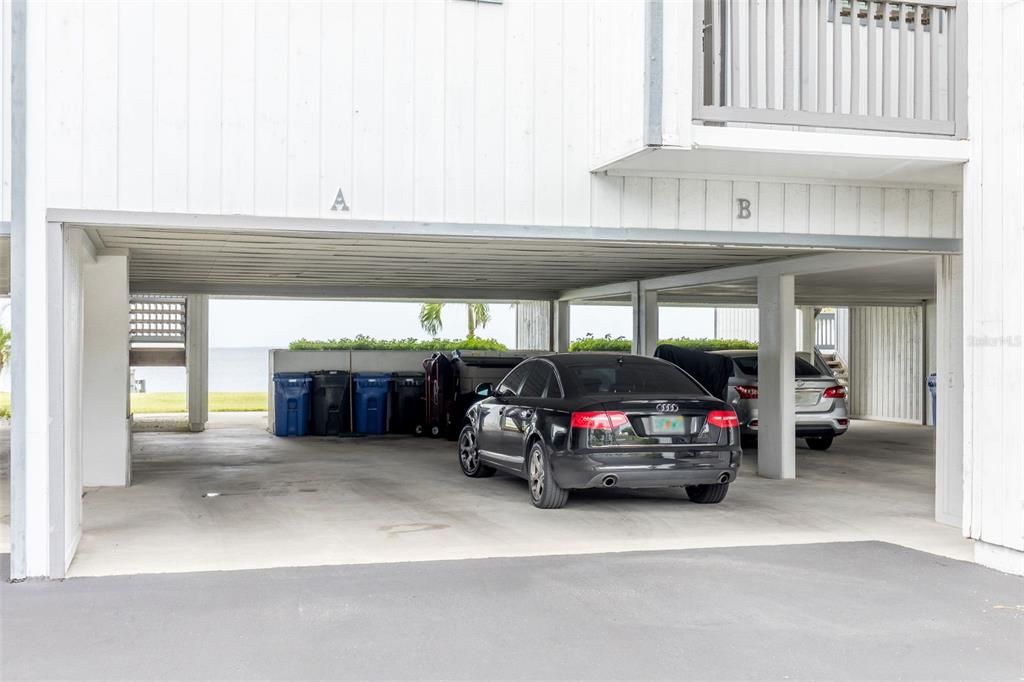 Carport accommodating 2 cars deep and extra room for an additional toy or two (B)