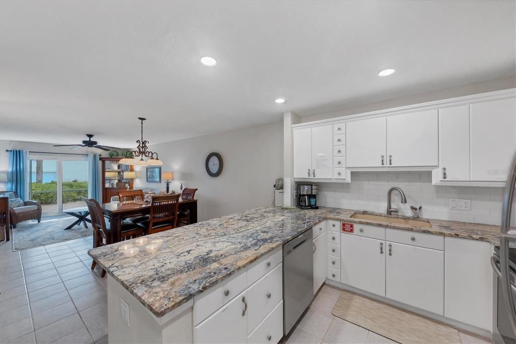 Updated kitchen with open living space and views to the beach!