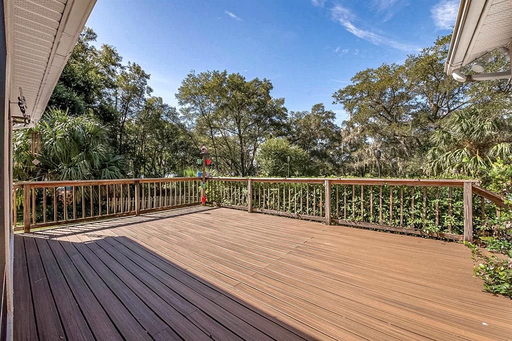 LARGE DECK OF SCREENED PORCH OF MAIN HOUSE