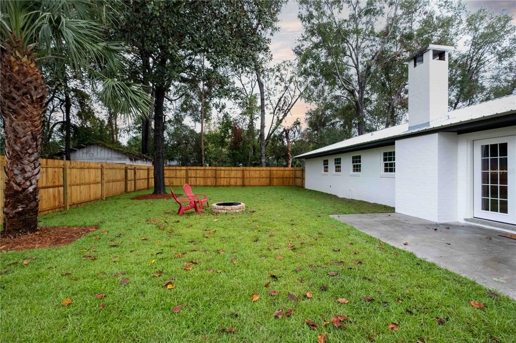 Large, fully fenced backyard