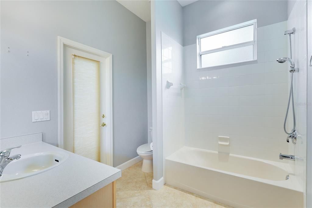 Guest bathroom features a tub/shower  and is right by #2 bedroom