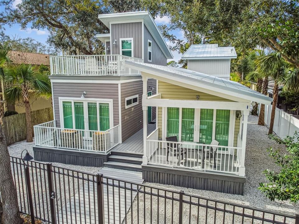 2 Story Rustic Tiny House on Left (1 story Coastal Tiny House on Right)