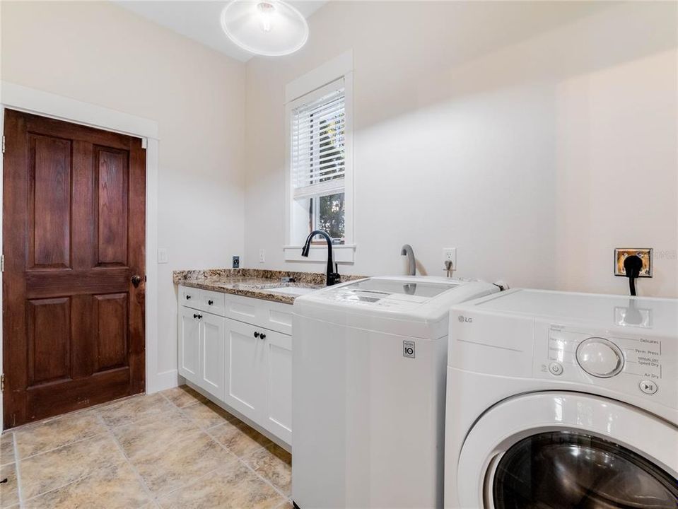 Laundry Room with access to 3 car garage