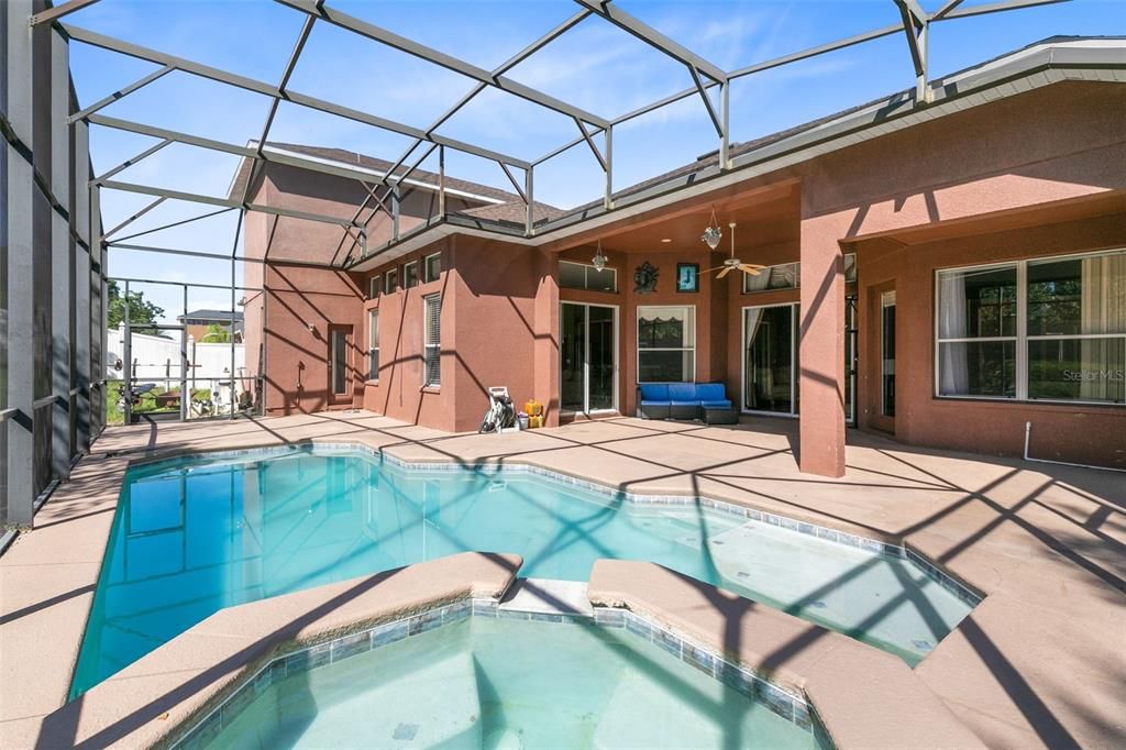 Screened Pool with Entry to Hall with Bathroom