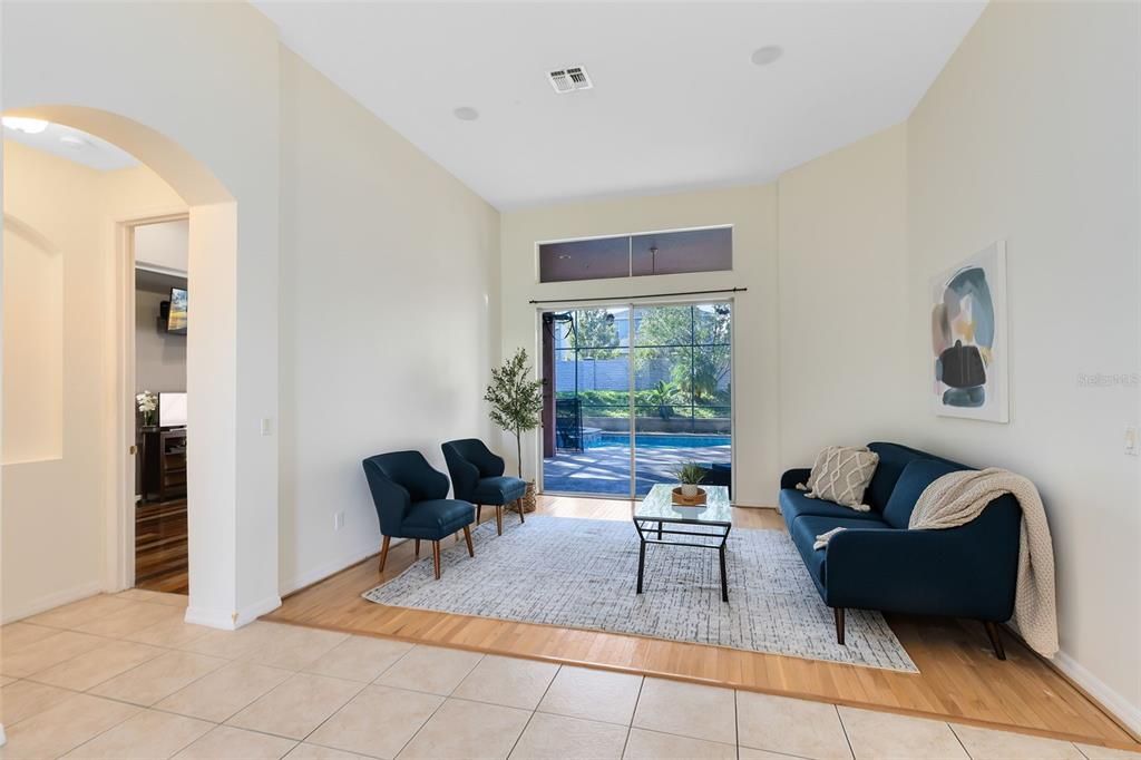 Living Room Overlooking Pool and Door to Primary Bedroom