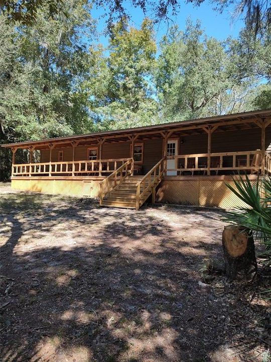 Full Length porch overlooking the water