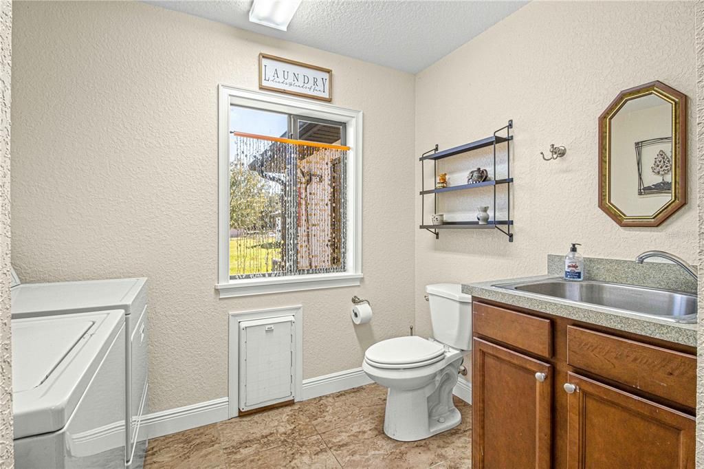 Laundry room with 1/2 bath