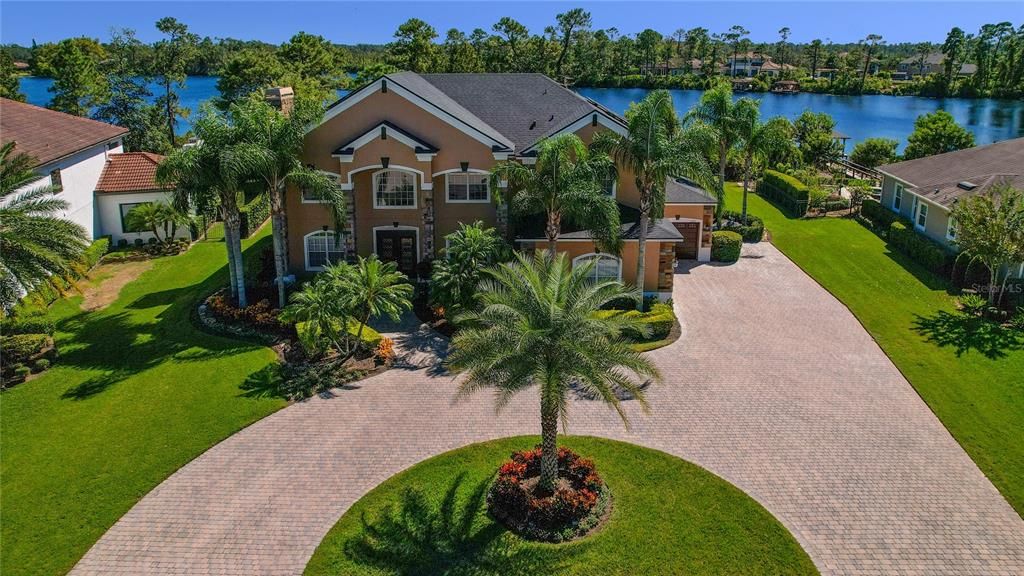 Look at the BEAUTIFUL home and the GORGEOUS LAKE right in your backyard