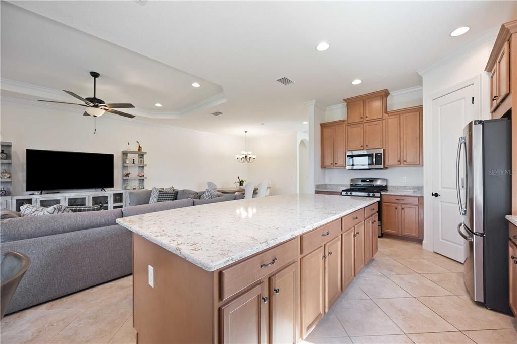 The countertops are quartz and the island has cabinets on both sides for lots of storage!