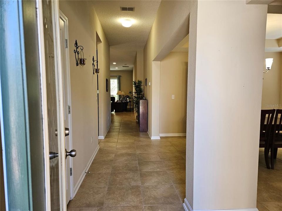 Open your front door to tiled floors, living room/dining combo and great light!