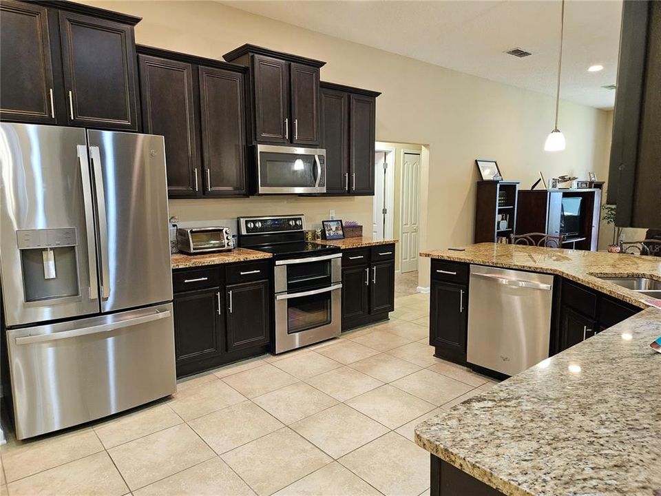 Granite countertops, 42" upgraded cabinets, all stainless appliances