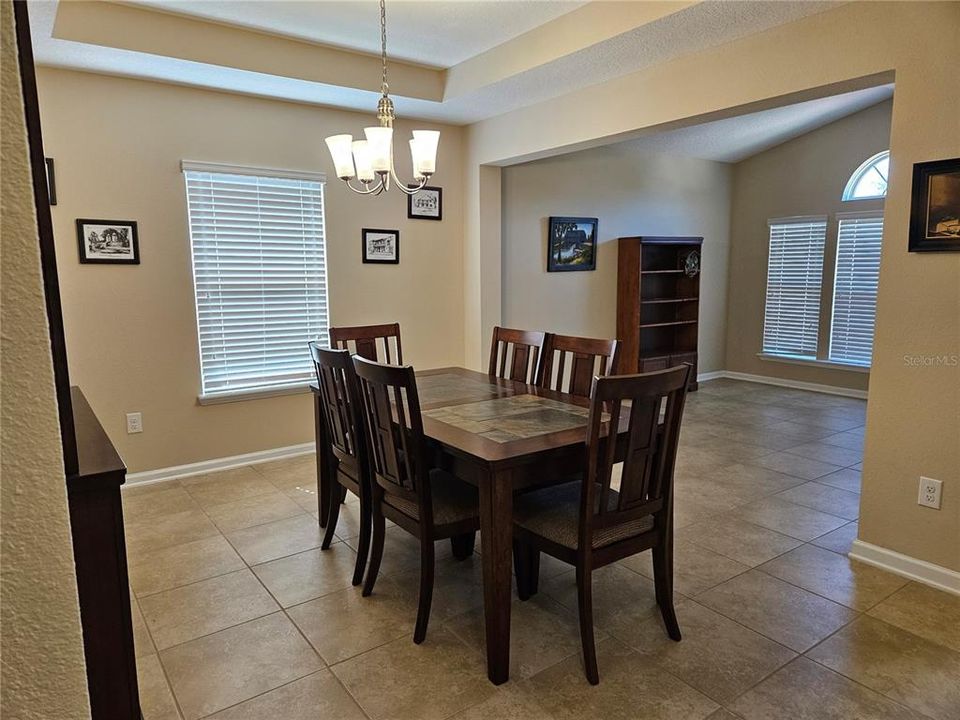 Formal dining room with tray ceiling