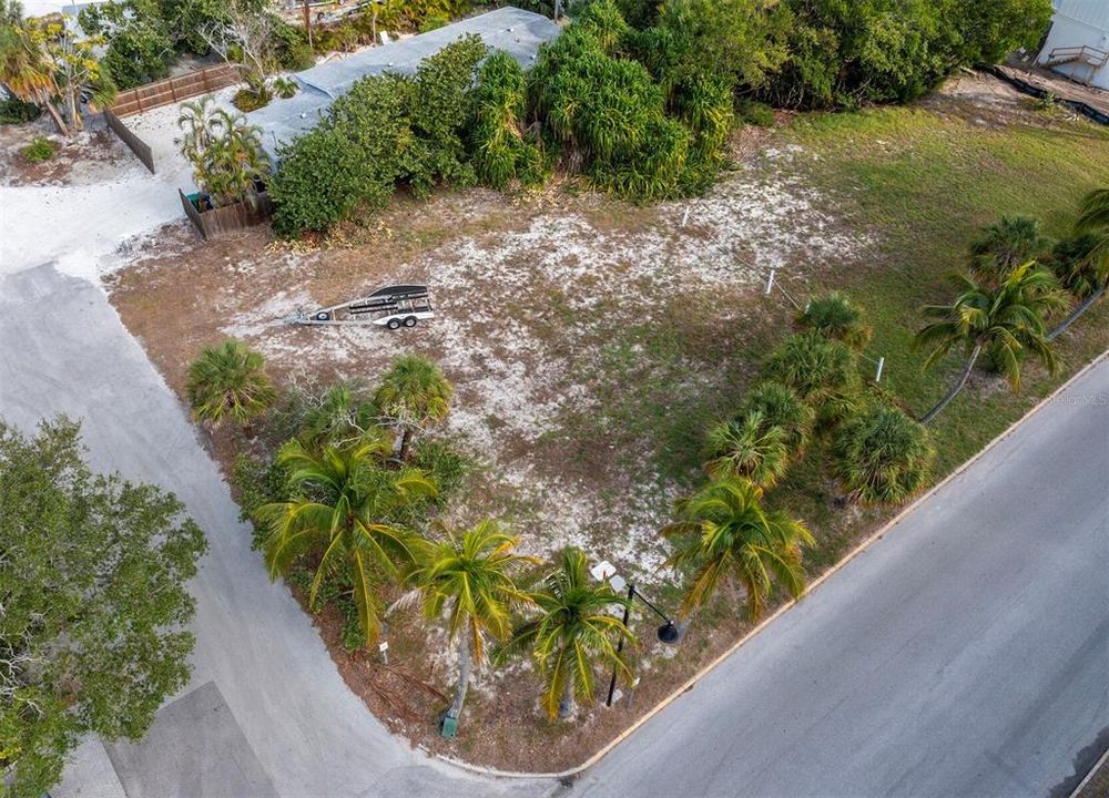 A fabulous location to build your dream home on the corner of Broadway Street and Palm in the Longbeach Village on Longboat Key