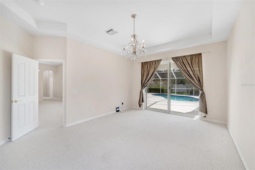 Master Bedroom with access to Lanai and Pool