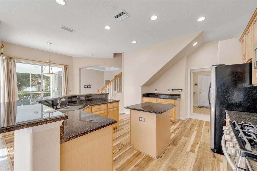 Kitchen with Granite countertops and backsplash