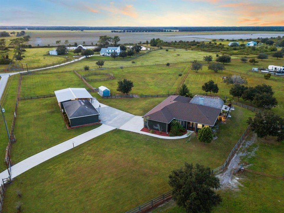 Aerial of the Home, Detached Garage, Barn, and western paddocks