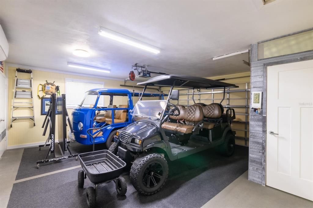 2 car garage with additional tool storage closets.