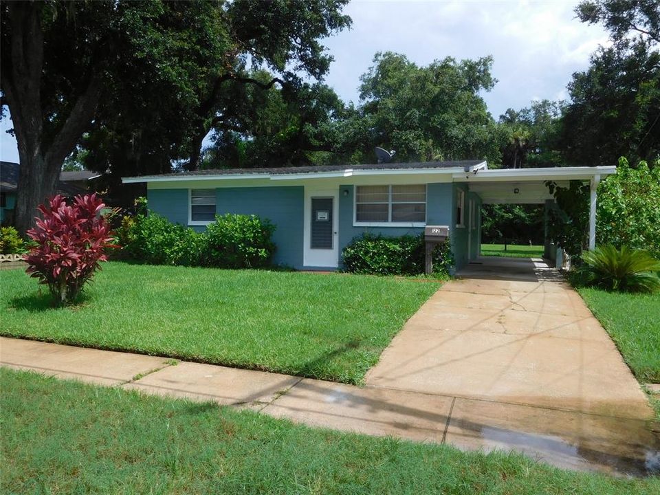 Adorable remodeled 2BR home on tree shaded lot in convenient area just into Edgewater from New Smyrna. 2 car carport, large family room, inside utility room.