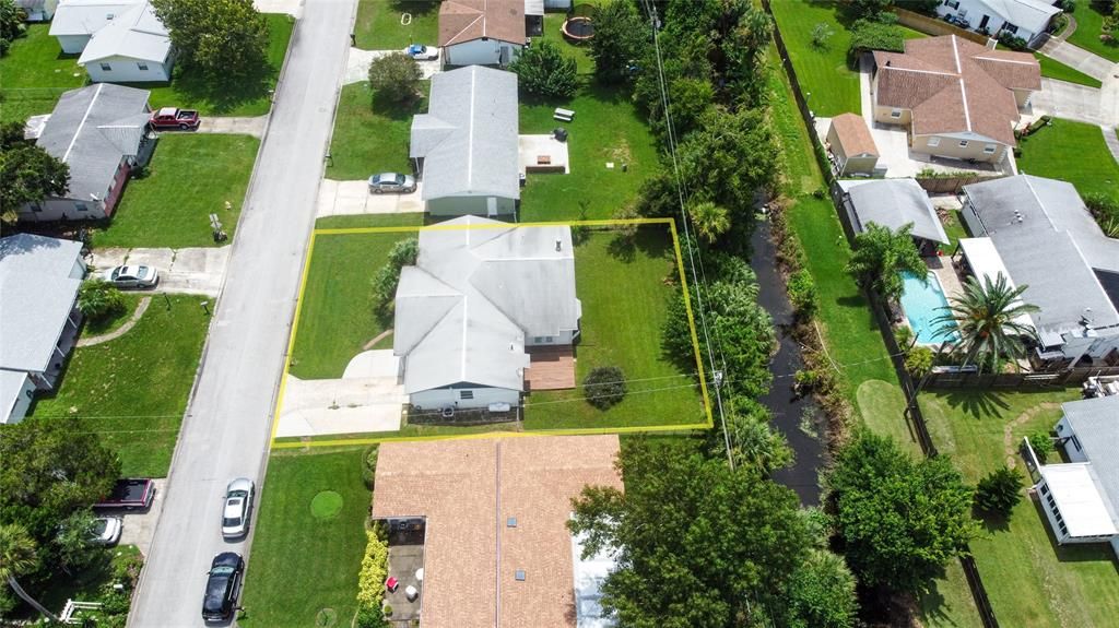 A creek runs behind the home between it and the adjacent property, giving a little extra privacy!