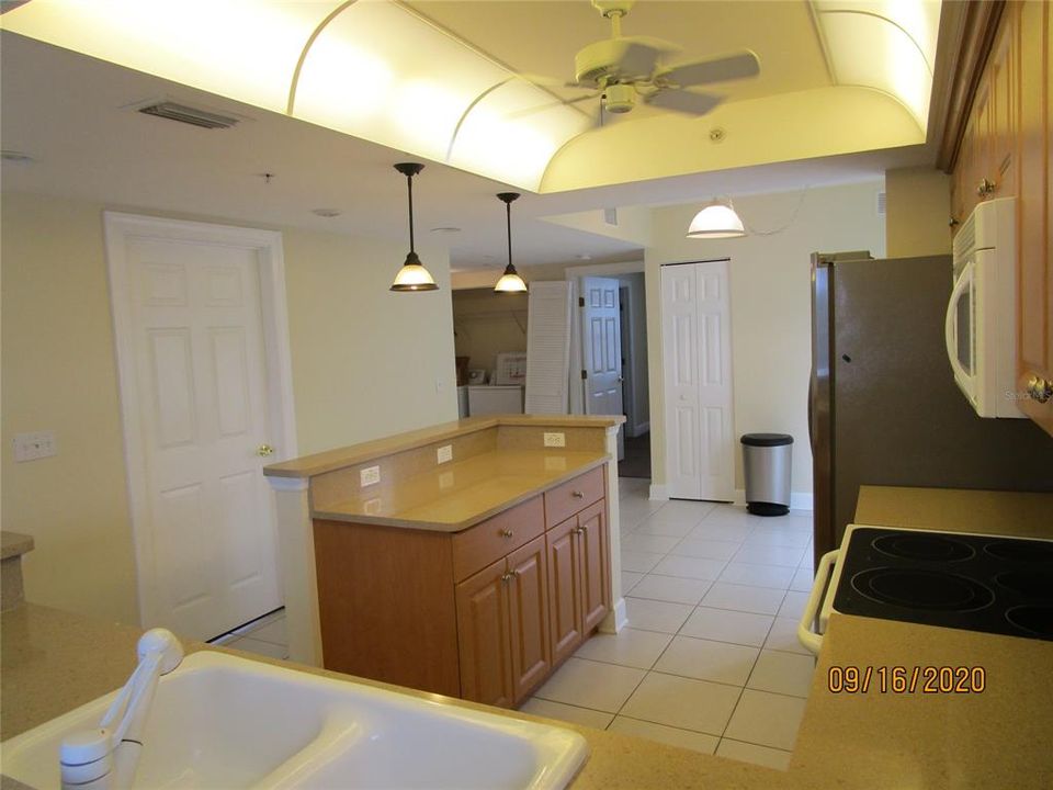 kitchen and island , at breakfast bar