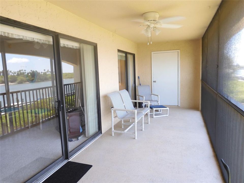 Spacious balcony accessible from both the living room & the master bedroom. It has a large storage closet with shelving for fishing gear, beach equipment & golf clubs.